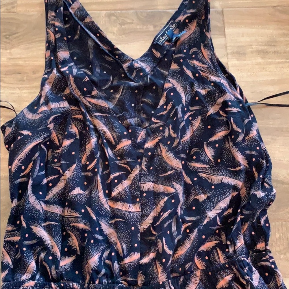 Women’s size SM pant romper w/ feather print